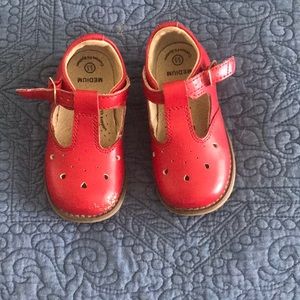 Little girl red shoes